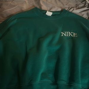 size medium, green nike hoodie.